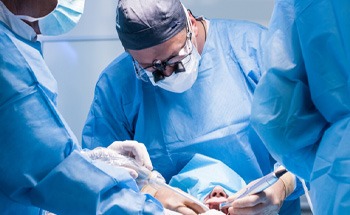 an oral surgeon placing dental implants in Goodyear