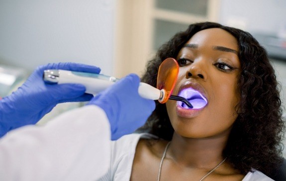 Patient receiving cosmetic dental bonding