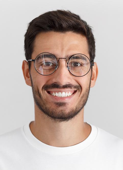 Portrait of smiling man wearing white t-shirt