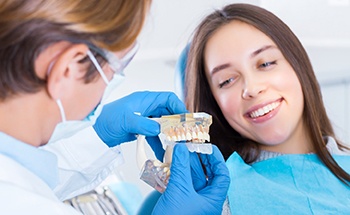 Implant dentist in Goodyear explaining how mouthguards are made