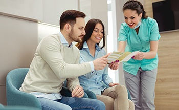 patients discussing the cost of dental implants in Goodyear