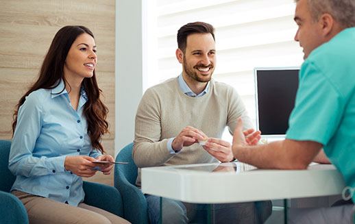 patients discussing the cost of Invisalign in Goodyear