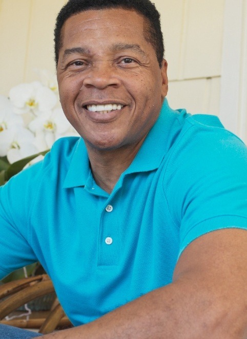 Man with healthy smile after periodontal disease treatment