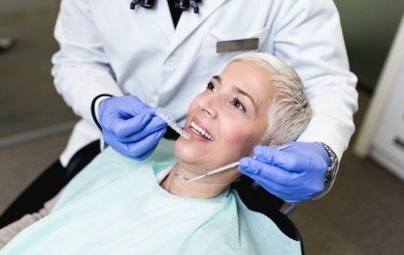 Woman being fitted for nightguards for bruxism