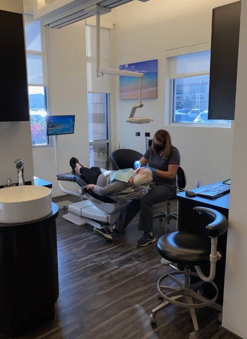 Relaxing dental patient at sedation dentistry visit