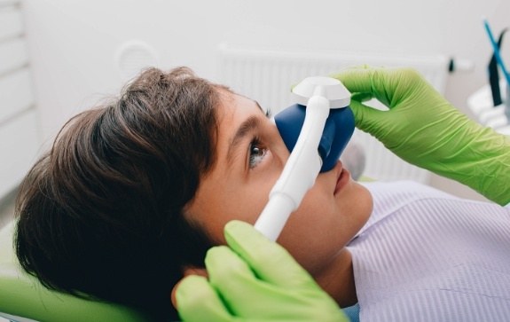 Patient receiving nitrous oxide dental sedation treatment